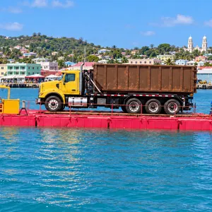 Island Sanitation Plus truck and equipment barge in St. John’s Harbour, Antigua
