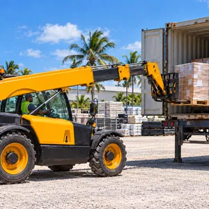 Telescopic forklift unloading palletised cargo from a shipping container, palm trees behind